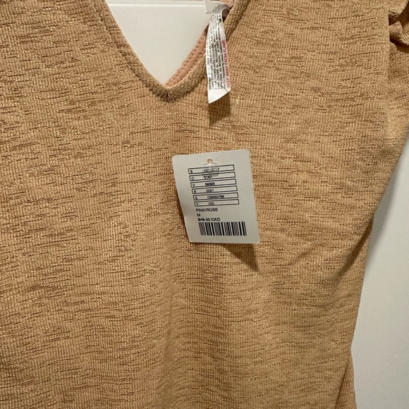 Body suit with ruffle detail. NWT. - Picture 3 of 3